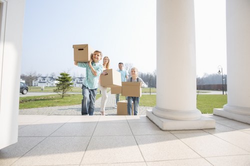 Careful packing and wrapping for fragile items during a Barbican move