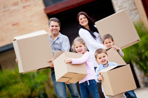 Packed boxes and furniture prepared for a local Barbican relocation
